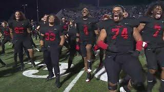 Euless Trinity's football team performs the Haka before facing Keller Timber Creek in the playoffs