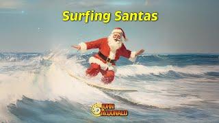 Surfing Santas (on Christmas Eve!) by John McDonald