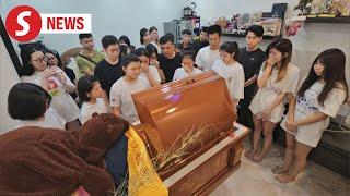 Family, friends pay last respects to Penang woman crushed by container