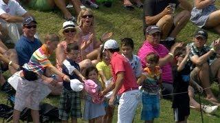 Rory McIlroy pleases the fans on No. 17 at THE PLAYERS