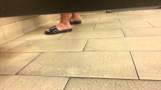 Candid restroom feet