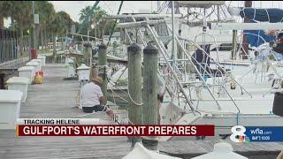 Gulfport residents board up homes and tie down boats ahead of storm