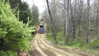 Western star dump truck spreading stone