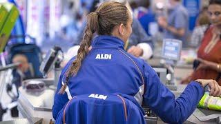 The Real Reason Aldi Cashiers Sit Behind The Register