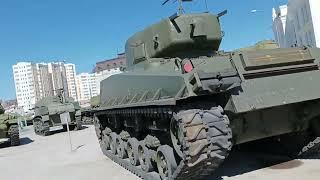 walk a military museum Russian tanks and planes inside