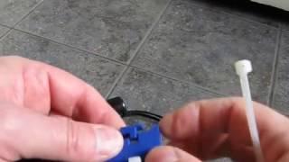 Remove horseshoe clip from Echo quick-release helmet strap buckle