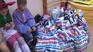 Игрушки и школьные принадлежности подарили детям полицейские ЕАО(РИА Биробиджан)