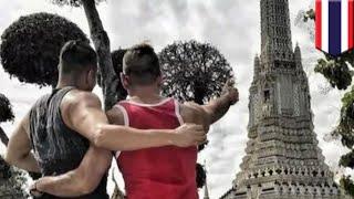 American tourists arrested Thailand: Couple busted for cheeky Buddhist temple snap - TomoNews