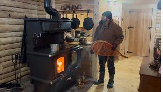 Log Cabin built in the North.Can I make with all that snow?kitchen wood stove working great .