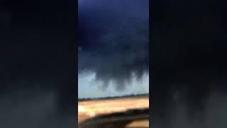 Large but weak multi-vortex tornado filmed near Ft. Cobb, Oklahoma near sunset.