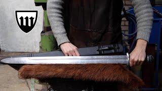 Forging a pattern welded viking sword, the complete movie.