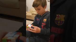 Connor conquers Rubik's cube in under 90 seconds with own algorithms