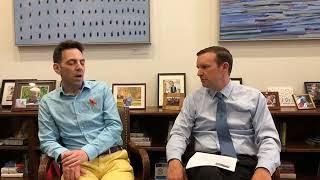 Peter Morley advocates for healthcare with Sen. Chris Murphy.