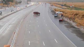 Cars seen spinning out/crashing after hurricane Hilary causes flooded lanes on the freeway, CA.