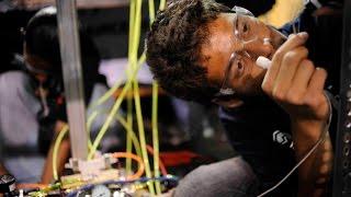 How to hook young people on math and science? Robots!