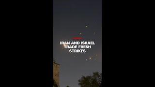 Iran and Israel trade strikes