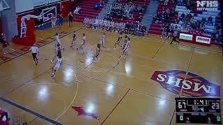 Marquette(MI)'s Jacob MacPhee dunks vs. Escanaba(MI)