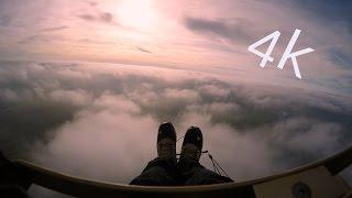 Magic 4k Paragliding Flight above the clouds