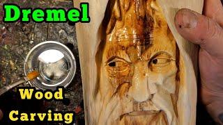 Carving A woodspirit in spalted wood with dremel.