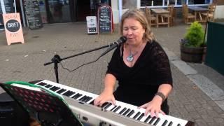 Julie Lewis sings and plays Sunny in Hope Square