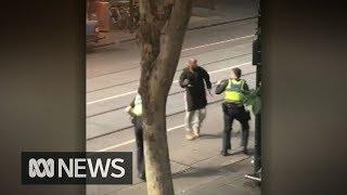 GRAPHIC VISION - Police shoot knife-wielding man in Bourke Street | ABC News