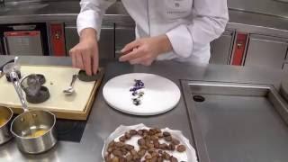 Reitbauer prepares a crepe dish at the Michelin star Steirereck