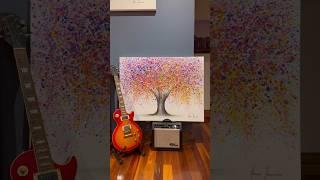 Ashvin Harrison Artist using coconut charcoal dust and acrylic to create rainbow tree   #art