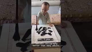 This three-year-old kid shows skills with ink brush