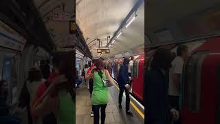 ARSENAL FANS IN LONDON UNDERGROUND