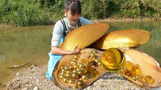 A golden water treasure, the girl found a golden mutated giant clam and many pearls in the river