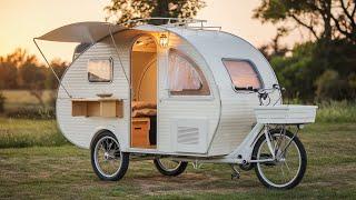 "Vintage Bicycle Camper: A Cozy Home for the Road"