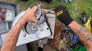 Scrapping more copper electric motors. Huge Pile of them.