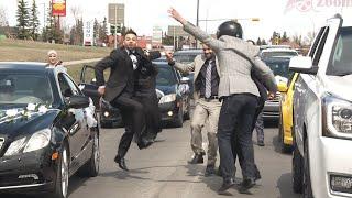 Arab groom dances dabke at traffic light 