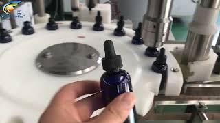 30ml tincture bottle filling machine, skin oil dropper bottle filling capping machine video