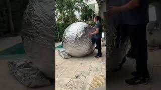 Inflatable Artistry: The Viral Silver Sphere Everyone’s Watching  #ArtInnovation #ViralMoment