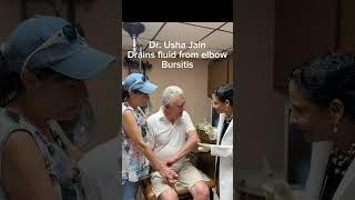 Dr. Usha Jain drains fluid from swollen elbow bursitis.#drushajain#bursitis of elbow#fluidinelbow