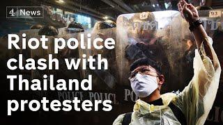 Riot police fire water cannon at pro-democracy protesters in Thailand