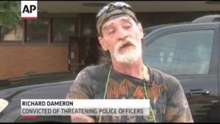 Ohio Man Who Threatened Cops Holds 'Idiot' Sign