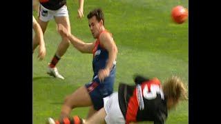 Big hit by Matthew Whelan on James Hird leads to a Travis Johnstone goal from outside 50 - 2005
