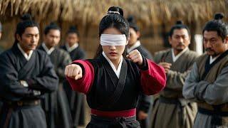 A thug bullies a blind girl, but she’s a martial arts master and knocks him away in one move.