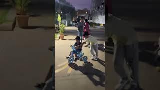 Babu teaching him how ride tricycle. #cutebabies #growingbabies #growingboys #brothers #babyfriends
