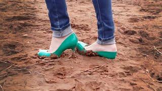 Muddy high heels at the field, broken high heels, muddy high heels, wet high heels (# 001)