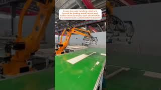 The Kewei four-axis handling robot arm is used for loading wood boards and lumber in the furniture,