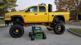 Power wheels Monster Truck Driving Under A Lifted Truck