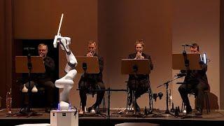 Slave to the rhythm: Three-armed robot conducts German symphony