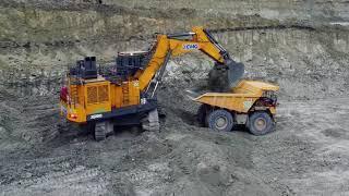 XCMG XE2000 mining excavators and XDR100 double-axle rigid mine trucks