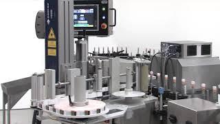 Model 130 BRONCO Labeler for Products in Pucks - NJM Labeling Systems