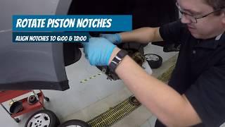 Retracting Rear Caliper Piston with Integral Parking Brake