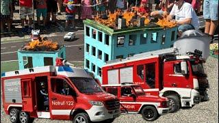 "RC Firefighters in Action: Battling Blaze at Miniature Buildings!"