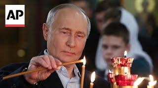 Russia's Putin attends Orthodox Christmas service in Moscow